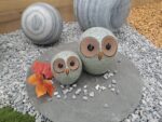 "Couple de hiboux décoratifs en céramique grise"