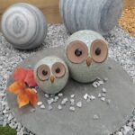 "Couple de hiboux décoratifs en céramique grise"