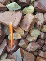 Roche à gabion rouge‑rose — pierres décoratives naturelles pour remplissage de gabions et aménagements paysagers.